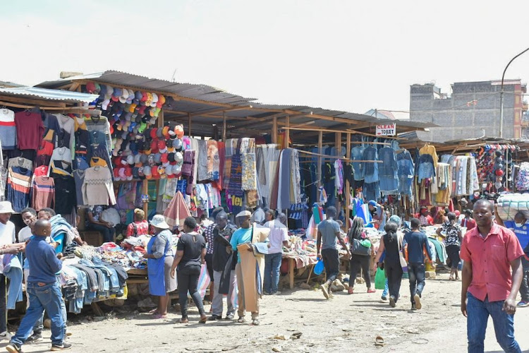 Business people in Gikomba market carry on their daily activities prior to the budget reading 2022/23 on April 7, 2022.