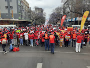 
Cosatu members march through the streets of the Pretoria CBD to the National Treasury during the trade union federation's day of national action.
