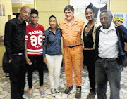 FORGIVEN: Eugene de Kock with the Mama family, from left, Ashley, Vuyo, widow Sandra, Candice and grandfather Roy.