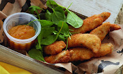 Coconut fried chicken strips with mango sauce.