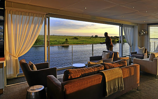 The lounge on the Zambezi Queen offers incredible views.