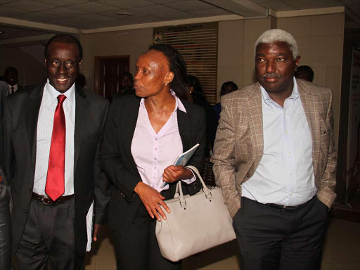 LET THE TRIAL CONTINUE: Lawyer Paul Muite, Deputy Solicitor General Muthoni Kimani and former PS Thuita Mwangi leave the Milimani law courts yesterday.
