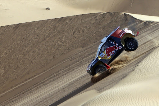 Peugeot driver Stephane Peterhansel of France drives during the 4th stage of the Dakar Rally 2015, from Chilecito to Copiapo January 7, 2015. REUTERS/Jean-Paul Pelissier (CHILE - Tags: SPORT MOTORSPORT TPX IMAGES OF THE DAY)