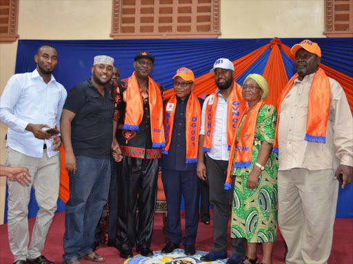 A file photo of Mombasa Governor Hassan Joho with his running mate William Kingi and other leaders from communities in the county. /MALEMBA MKONGO