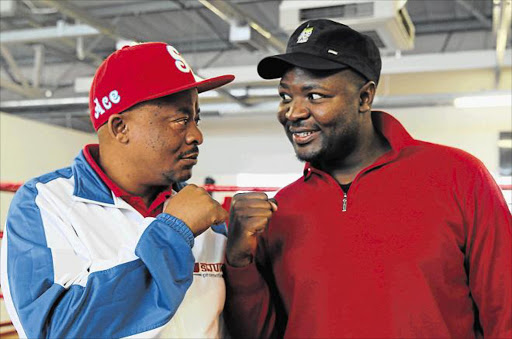 KNOCKOUT BLOW: Embattled boxing promoter Andile Sidinile with Eastern Cape Boxing Promoters Association chairman Ayanda Matiti