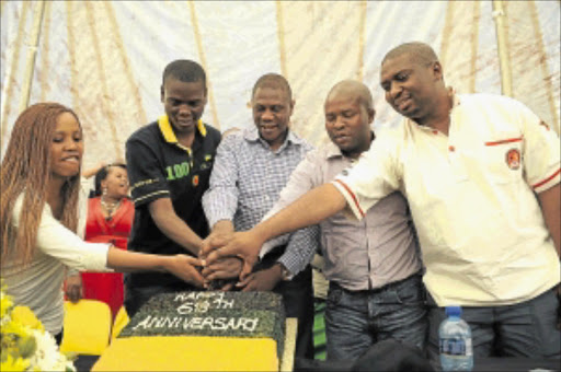 IN CELEBRATORY MOOD: Kenetswe Mosenogi, Ronald Lamola, Paul Mashatile, Lebo Maile and Young Communist League leader Buti Manamela at the 68th anniversary celebration of the ANCYL in Johannesburg. Photo: Tsheko Kabasia