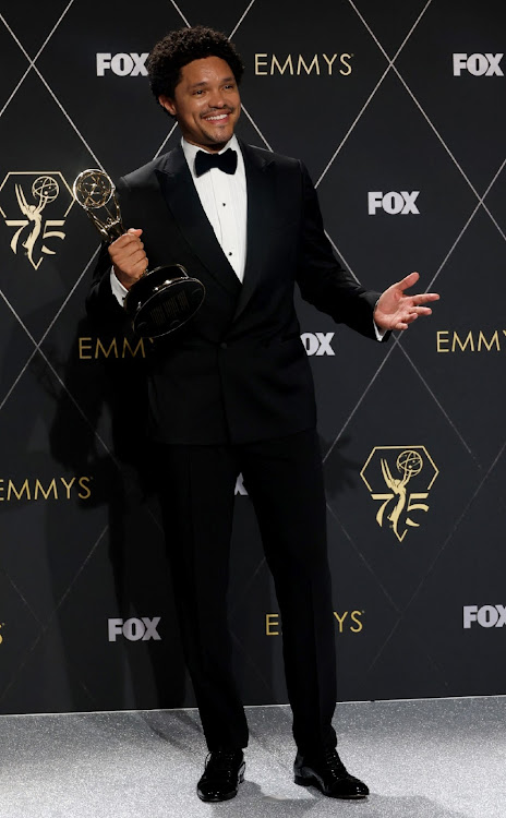 Trevor Noah poses with the Variety Series award for "The Daily Show with Trevor Noah" at the 75th Primetime Emmy Awards.