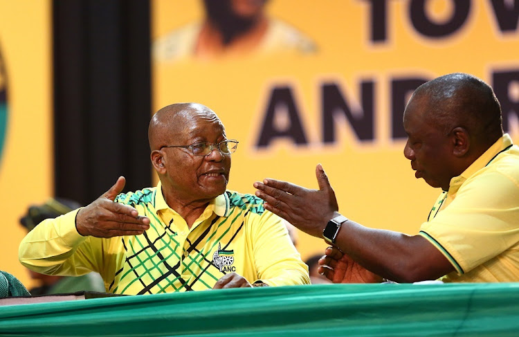 FILE PHOTO: Jacob Zuma and the newly elected ANC President Cyril Ramaphosa share a light moment during the 54th ANC National Conference taking place in Nasrec.