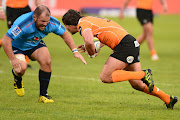 Jacobie Adriaanse of the Bulls and Francois Venter(c) of the Cheetahs during the Super Rugby match between Vodacom Bulls and Toyota Cheetahs at Loftus Versfeld on April 22, 2017 in Pretoria, South Africa.