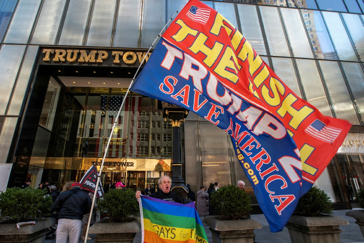 Supporters of Republican presidential candidate and former US president Donald Trump gather outside Trump Tower after a hearing in Trump’s criminal court case on charges stemming from hush money paid to a porn star, in New York City, US, in this file photograph. Picture: REUTERS/EDUARDO MUNOZ