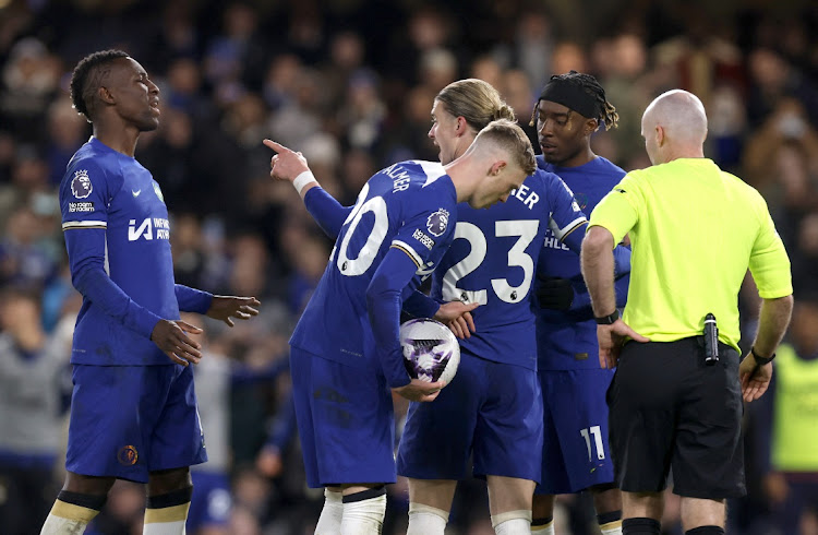 Chelsea's Nicolas Jackson clashes with Noni Madueke as Conor Gallagher intervenes and Cole Palmer prepares to take the penalty in their Premier League win against Everton at Stamford Bridge in London on Monday night.