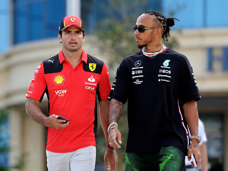 Lewis Hamilton, right, will replace Carlos Sainz at Ferrari in 2025. Picture: REUTERS