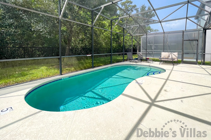 Sun-drenched west-facing pool deck at this Bella Vida vacation villa in Kissimmee