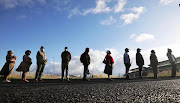 Voters queue to cast their votes in Macassar in the Western Cape on Monday. The ANC secured 46.05% of the votes nationally.