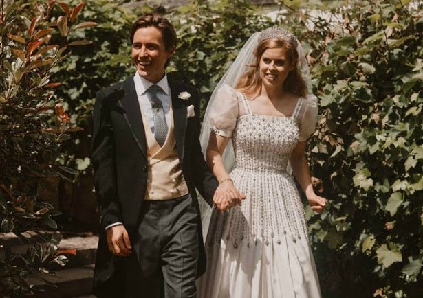 Princess Beatrice updated her grandmother's vintage gown by giving it a sleeker hemline and adding puffy sleeves for her Windsor wedding to Edoardo Mapelli Mozzi in July 2020.