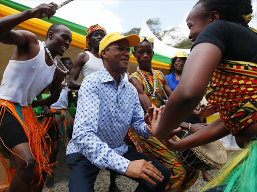 United Democratic Movement Party Leader Philip Murgor join dancers during party's aspirants and leaders meeting at the headquarters in Nairobi on January 30, 2017. Photo/Jack Owuor