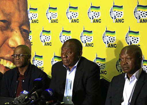 President Cyril Ramaphosa is flanked by ANC secretary-general Ace Magushule and Deputy President David Mabuza. Ramaphosa is likely to throw in the towel at ANC's 2022 elective conference.