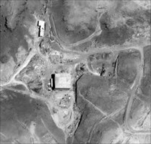 NUCLEAR THREAT? Satellite image by DigitalGlobe shows a suspected nuclear reactor site in Syric. © AP.