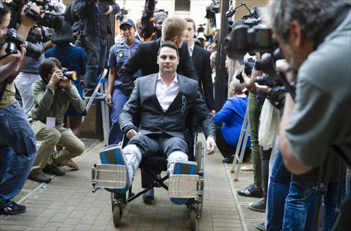 Carl Pistorius arrives at the Pretoria High Court on September 11, 2014, in Pretoria, South Africa. Oscar Pistorius, stands accused of the murder of his girlfriend, Reeva Steenkamp, on February 14, 2013. This is Pistorius' official trial, the result of which will determine the paralympian athlete's fate. Judge Masipa has began delivering her verdict. Gallo Images