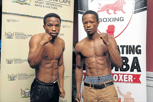 ON TENTERHOOKS: Siphamandla Baleni, left, here seen with Daluxolo Mangcotywa, may fight Simpiwe Konkco Picture: MARK ANDREWS