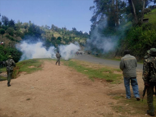 Police disperse crowds after a public meeting on the Sh30 billion Arror dam in Marakwet West turned violent in Kipsaiya on Tuesday /STEPHEN RUTTO
