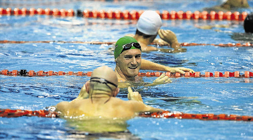 THE SMILE OF A WINNER: Cameron van der Burgh won his heat of the men's 100m breaststroke at the SA National Aquatic Champs 2014 in Durban last night to qualify for tonight's final