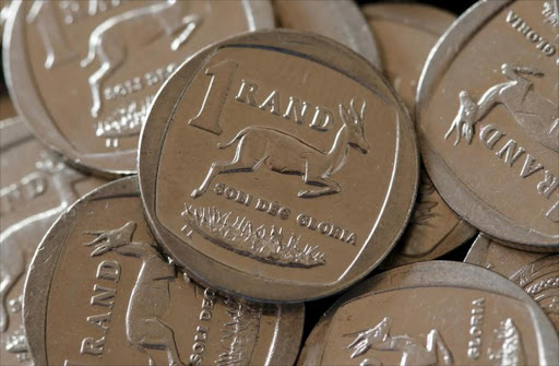 South African Rand coins are seen in this photo illustration. REUTERS/Mike Hutchings