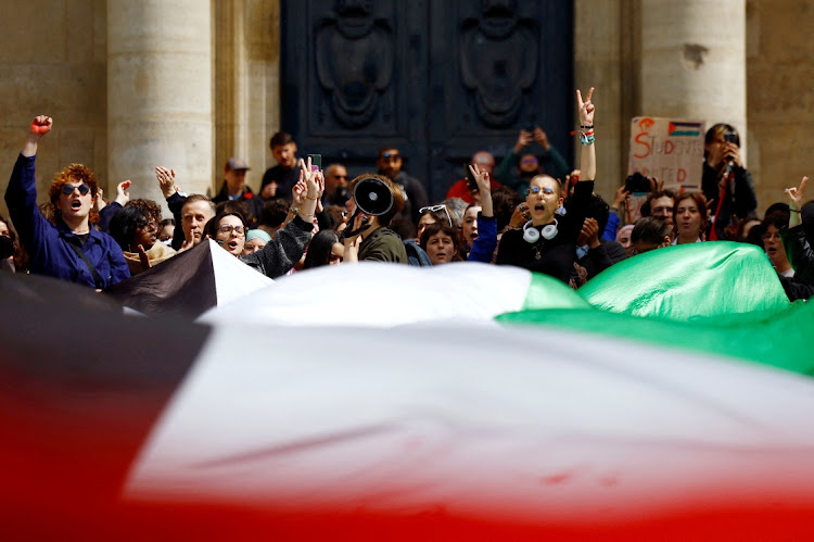 Students hold a large Palestinian flag during a protest in Paris, France, April 29 2024. Picture: Reuters/Sarah Meyssonnier