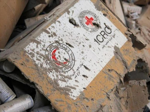 Damaged Red Cross and Red Crescent medical supplies lie inside a warehouse after an airstrike on the rebel held Urm al-Kubra town, western Aleppo city, Syria September 20, 2016. /REUTERS