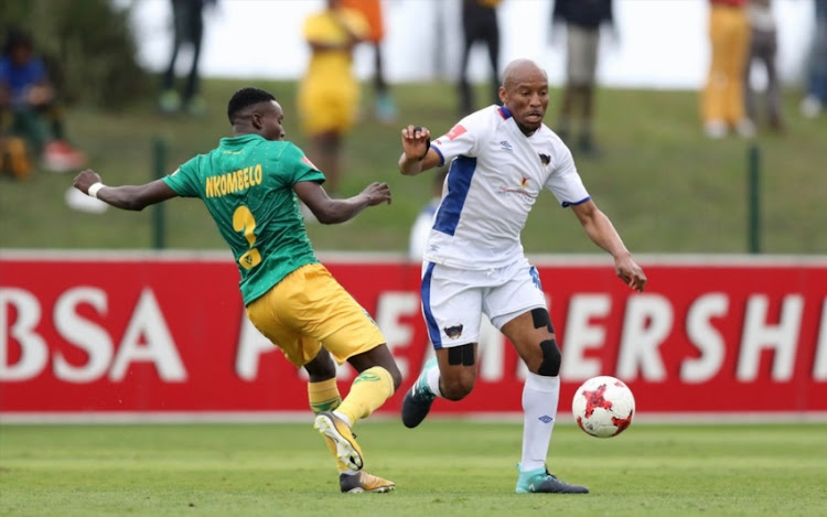 Zolani Nkombelo of Golden Arrows and Katlego MAshego of Chippa United during the Absa Premiership match between Golden Arrows and Chippa United at Princess Magogo Stadium on September 30, 2017 in Durban, South Africa.