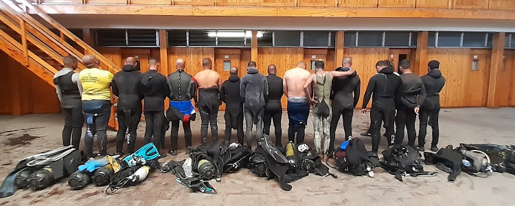 Some of the 24 alleged abalone poachers who were arrested at Robben Island on Tuesday.