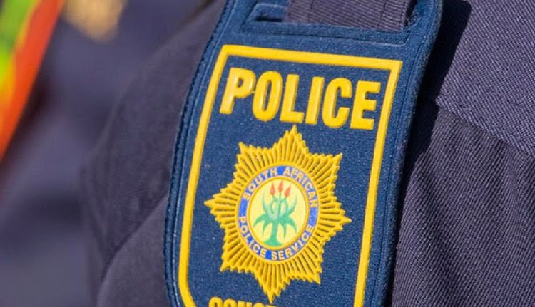 Close up of the SAPS badge on an officer's uniform.