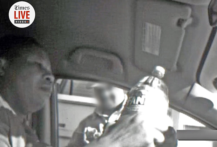 A screengrab from the produced video showing Nomia Rosemary Ndlovu, a former policewoman, passing a two-litre bottle of petrol to an undercover cop.