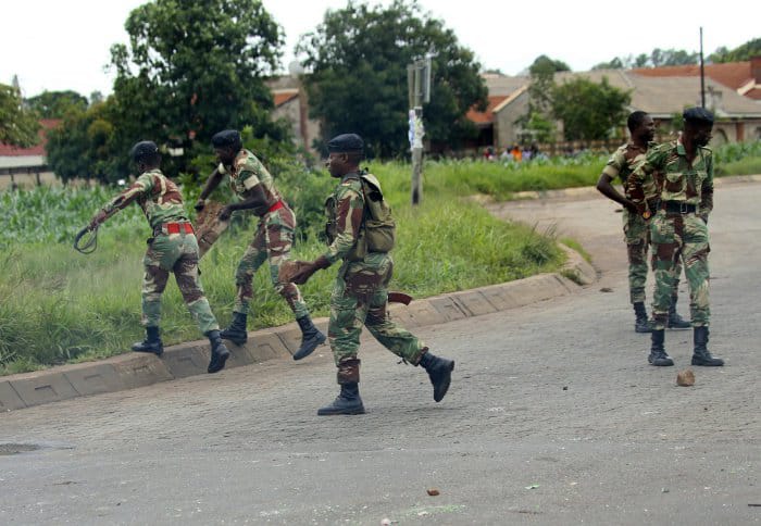 Soldiers patrolling streets in Zimbabwe amid civil unrest over a massive spike in fuel prices last month.