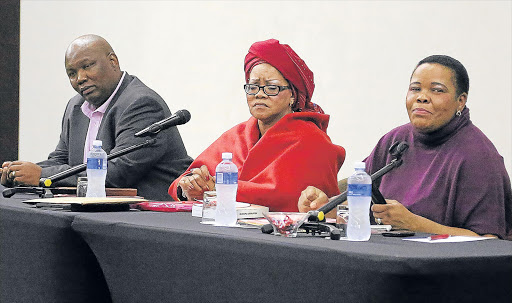 PRESSURE MOUNTING: Deputy mayor Themba Tinta, executive mayor Zukiswa Ncitha and Speaker Luleka Simon at the council meeting yesterday at the ICC Picture: MARK ANDREWS