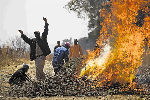 Violent scenes such as those witnessed yesterday at KDC mine are sending the wrong signal about South Africa as a stable investment destination Picture: DANIEL BORN