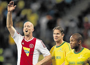 Matthew Booth, of Ajax CT, left, and Alje Schut of Mamelodi Sundowns, centre,at the Absa Premiership match in Cape Town last month