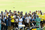 Kaizer Chiefs players and staff celebrate chairman and owner  Kaizer Motaung's 75th  birthday during the club's  media open day in Naturena  yesterday. Amakhosi face Cape Town City on Saturday.  