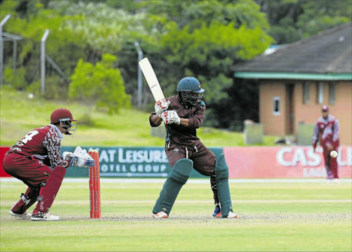 ON ATTACK: Border’s Mncedisi Malika opens his shoulders for a big hit during the exciting match against North West yesterday Picture: SINO MAJANGAZA