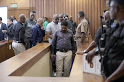 Senzo Meyiwa murder accused leave the dock after appearing in the North Gauteng High Court in Pretoria. 