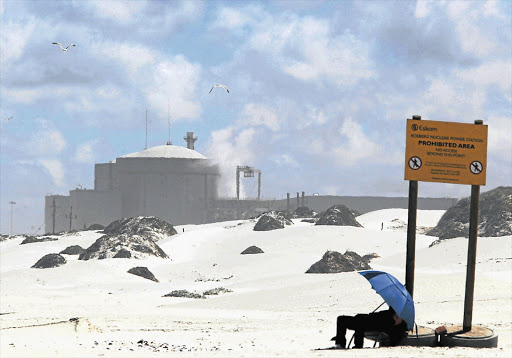 NO-GO AREA: Eskom's Koeberg nuclear plant looms over the wind-swept sand and rocks of Melkbosstrand in Cape Town