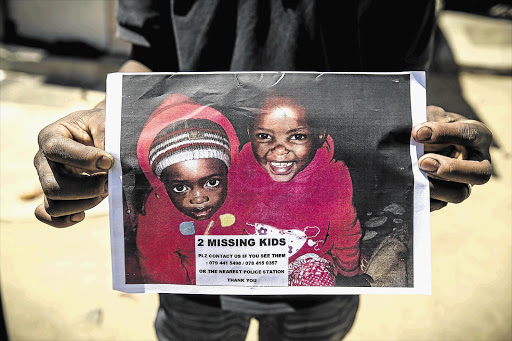 GONE FOREVER: A photograph of Yonelisa Mali, 2, and her three-year-old cousin, Zandile Mali, that was used after their disappearance in Diepsloot, north of Johannesburg, at the weekend. The bodies of the children were found yesterday, sparking furious protests