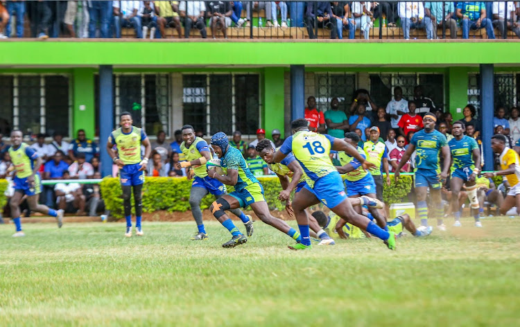 KCB’s Trevor Odawa charges past his opponent during a Kenya Cup semi-final clash against Menengai Oilers played at the KCB Sports Club, Ruaraka