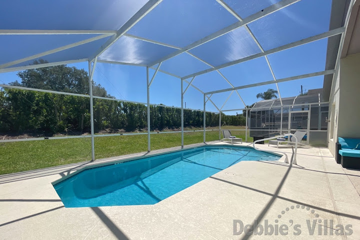 Sun-drenched private pool deck at this Davenport vacation villa