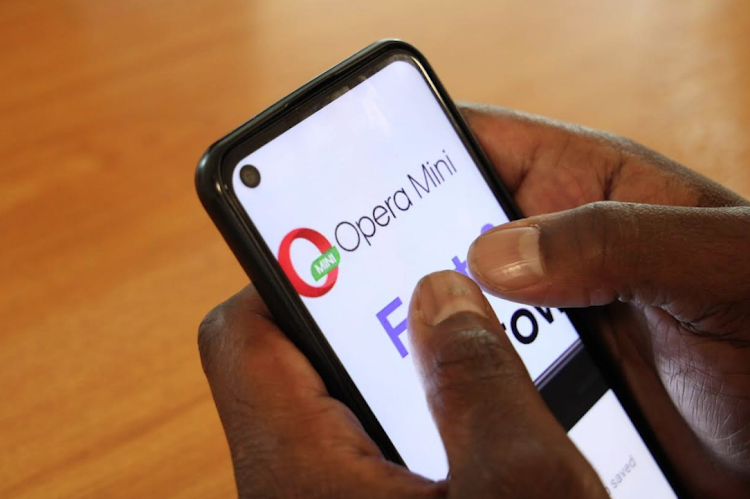 A person uses the Opera Mini app/LEAH MUKANGAI