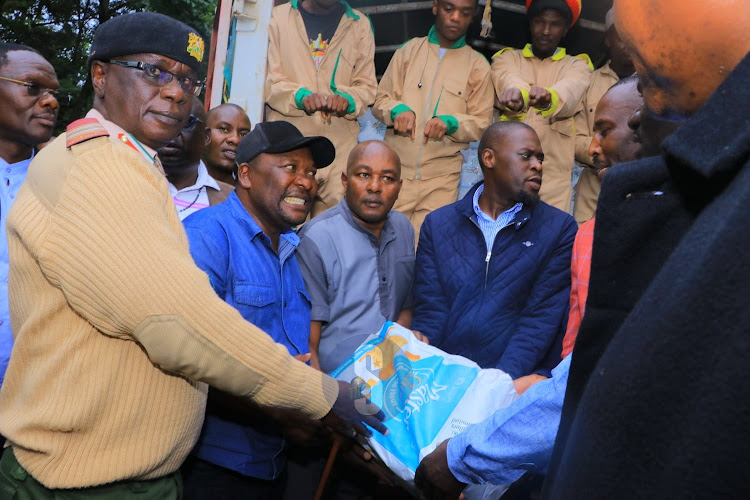 Nairobi Governor Johnson Sakaja distributes relief food to victims of floods in Kibera on April 29, 2024.