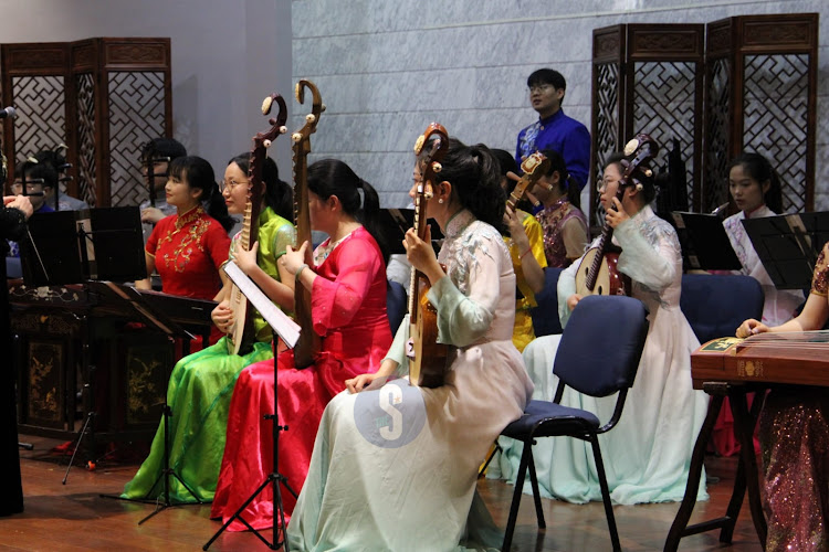 Nanjing University traditional instrument orchestra choir performs during the diversity, beauty and harmony traditional Chinese musical instrument performance at the University of Nairobi main campus on April 18, 2024