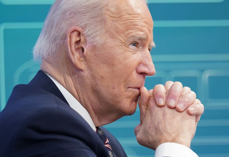 US President Joe Biden listens during a virtual roundtable on securing critical minerals at the White House in Washington, US, February 22, 2022.