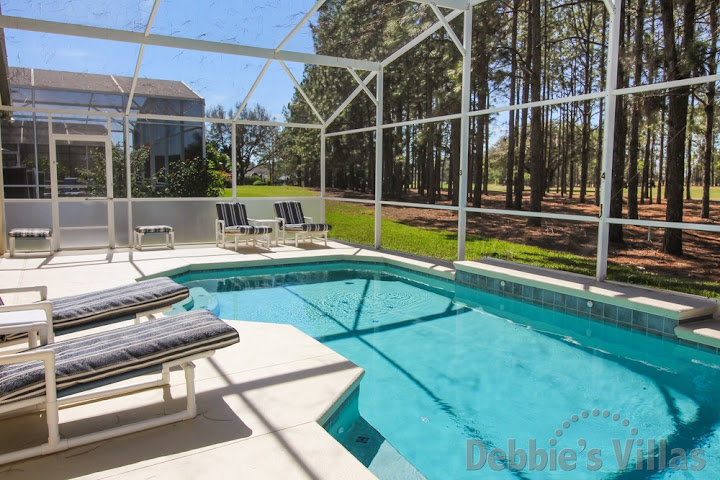 Sit back, relax and enjoy the Florida sun at this Highlands Reserve villa