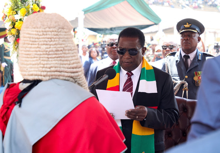 Zimbabwe President Emmerson Mnangagwa takes an oath of office during his inauguration at the National Sports Stadium in Harare, Zimbabwe September 4, 2023.